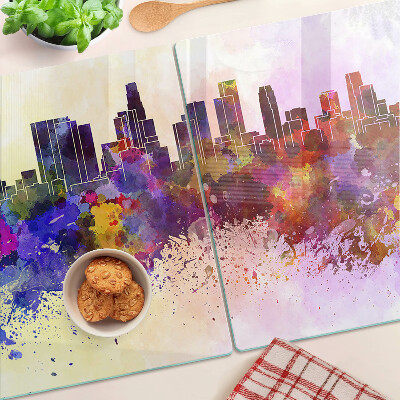 Tagliere in vetro temperato con stampa a acquerello raffigurante uno skyline urbano