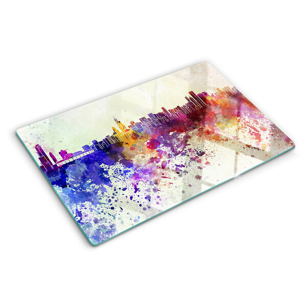 Tagliere in vetro con stampa del panorama della città in macchie colorate