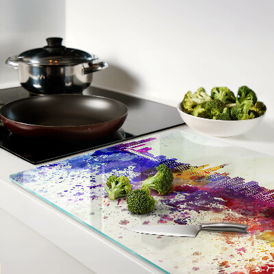 Tagliere in vetro con stampa del panorama della città in macchie colorate