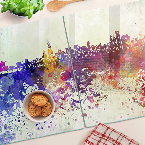 Tagliere in vetro con stampa del panorama della città in macchie colorate