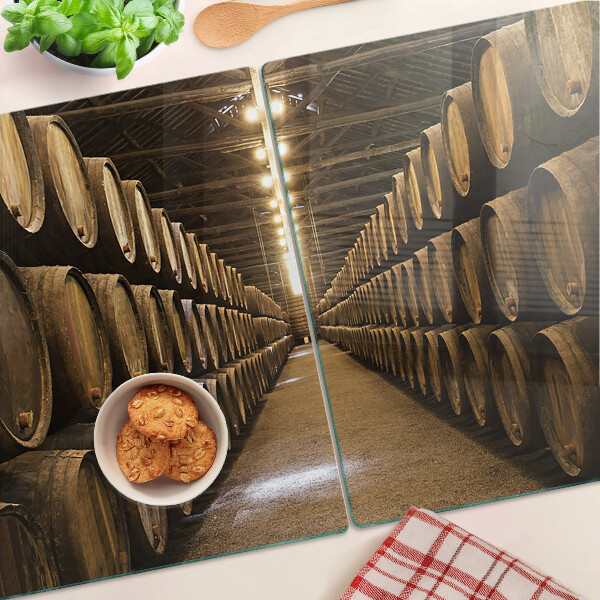 Tagliere in vetro con stampa raffigurante l'interno di una cantina con botti