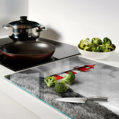 Tagliere in vetro temperato con stampa raffigurante un faro nel paesaggio