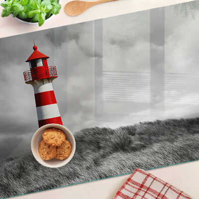 Tagliere in vetro temperato con stampa raffigurante un faro nel paesaggio