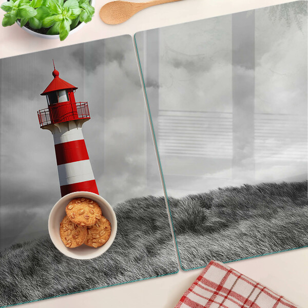 Tagliere in vetro temperato con stampa raffigurante un faro nel paesaggio