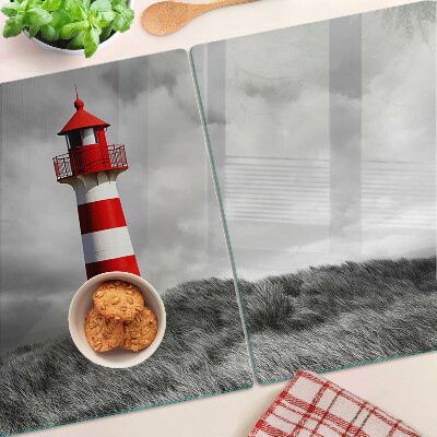 Tagliere in vetro temperato con stampa raffigurante un faro nel paesaggio