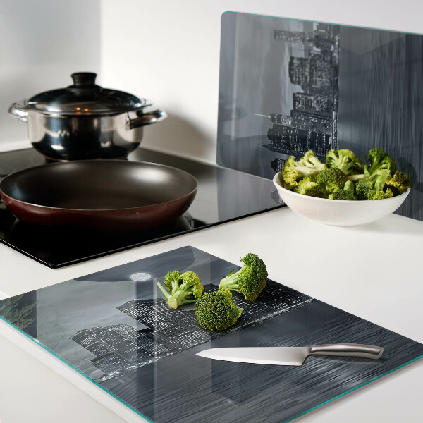 Tagliere in vetro con stampa del panorama della città riflesso a notte