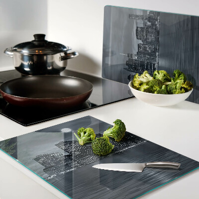 Tagliere in vetro con stampa del panorama della città riflesso a notte