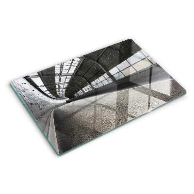 Tagliere in vetro temperato con motivo di architettura moderna e geometrie decorative