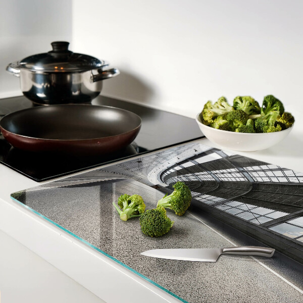 Tagliere in vetro temperato con motivo di architettura moderna e geometrie decorative