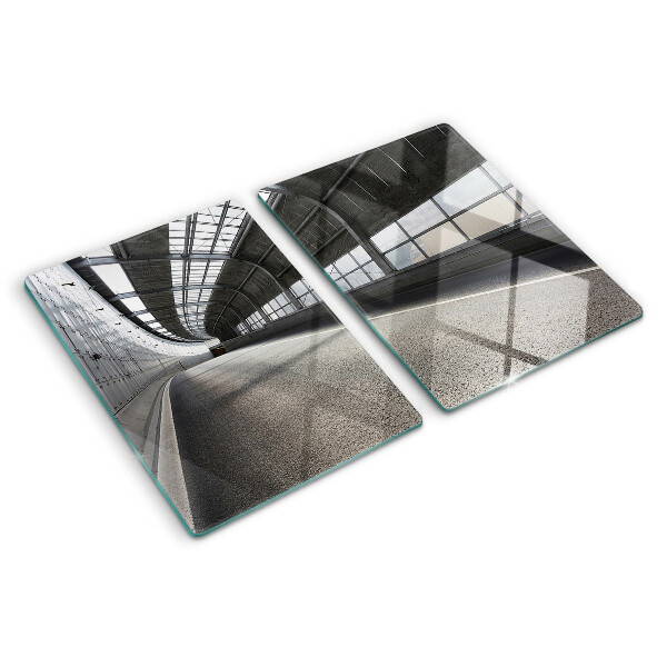 Tagliere in vetro temperato con motivo di architettura moderna e geometrie decorative