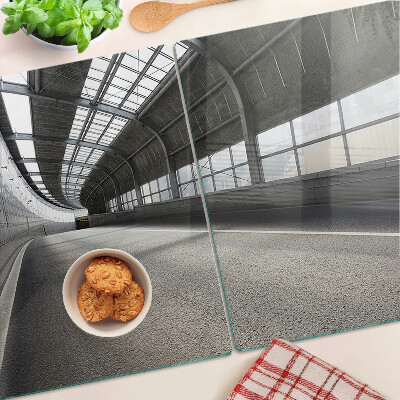 Tagliere in vetro temperato con motivo di architettura moderna e geometrie decorative