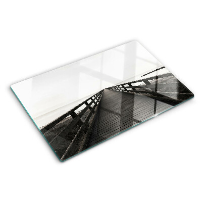 Tagliere in vetro temperato con stampa raffigurante un pontile di legno sull'acqua