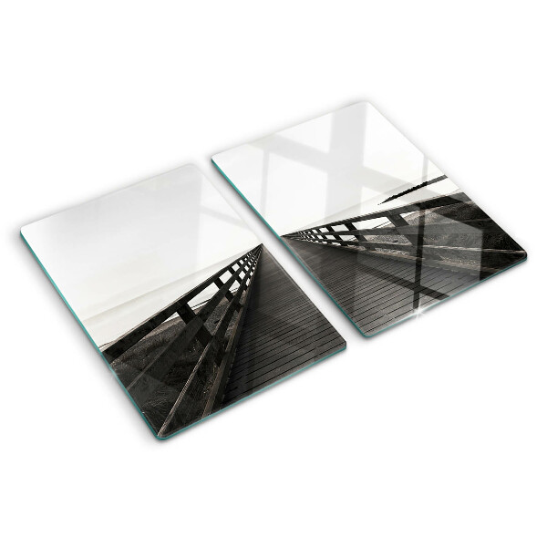 Tagliere in vetro temperato con stampa raffigurante un pontile di legno sull'acqua