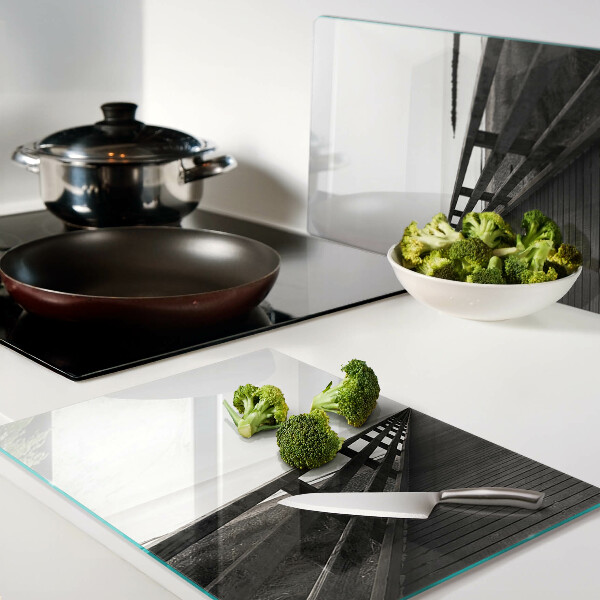 Tagliere in vetro temperato con stampa raffigurante un pontile di legno sull'acqua