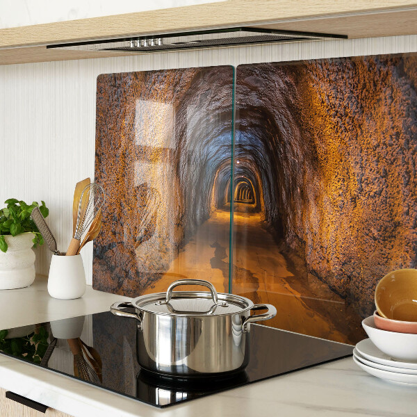 Tagliere in vetro temperato con stampa di un tunnel in una grotta e illuminazione