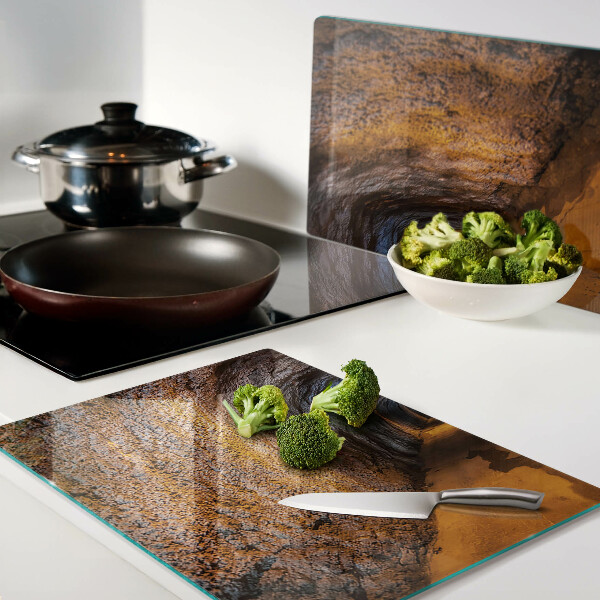 Tagliere in vetro temperato con stampa di un tunnel in una grotta e illuminazione