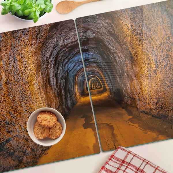 Tagliere in vetro temperato con stampa di un tunnel in una grotta e illuminazione