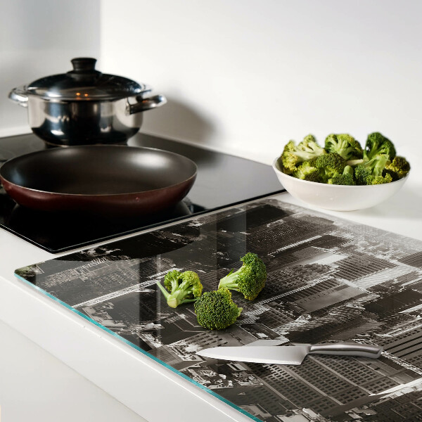 Tagliere in vetro con stampa del panorama della città nei toni del bianco e nero