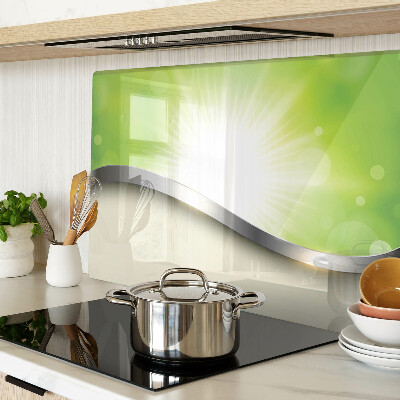 Tagliere in vetro temperato con motivo bokeh verde con raggi di luce