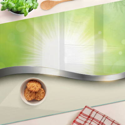 Tagliere in vetro temperato con motivo bokeh verde con raggi di luce