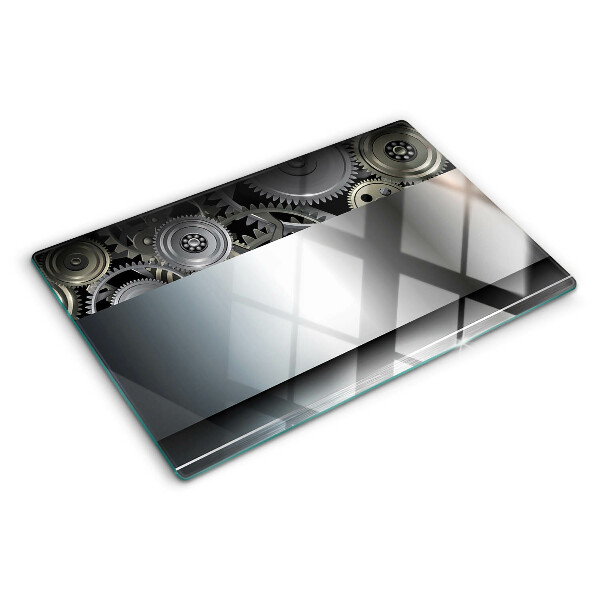Tagliere in vetro con motivo di ingranaggi meccanici e superfici metalliche