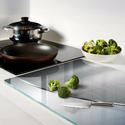 Tagliere in vetro temperato con finitura metallica dai riflessi luminosi