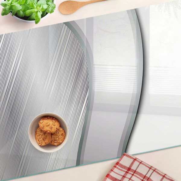 Tagliere in vetro con motivo ondulato astratto