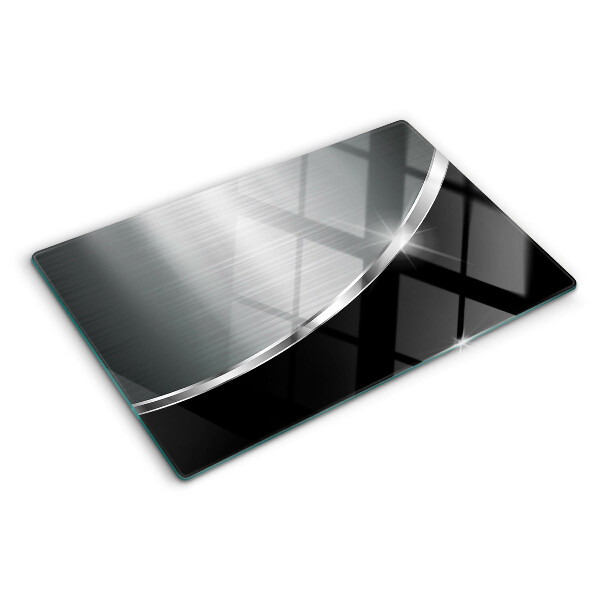 Tagliere in vetro con finitura metallica e riflessi decorativi