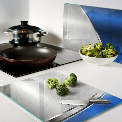 Tagliere in vetro temperato con motivo metallico e accenti blu