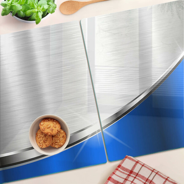 Tagliere in vetro temperato con motivo metallico e accenti blu