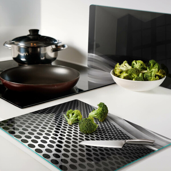 Tagliere in vetro con motivo futuristico a onde