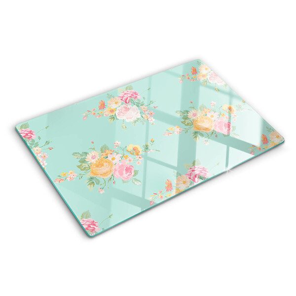 Tagliere in vetro temperato con motivo floreale nei toni pastello