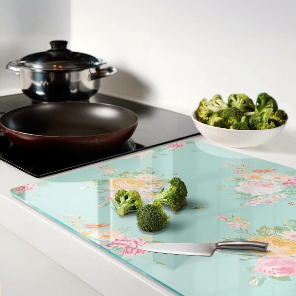 Tagliere in vetro temperato con motivo floreale nei toni pastello