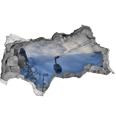 Adesivo con vista dietro il muro Funivia di montagna sopra le nuvole
