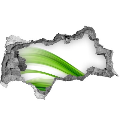 Adesivo con vista dietro il muro Un prato verde visibile attraverso un buco nel muro