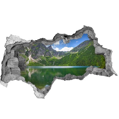 Sticker effetto rottura muro Paesaggio montano in riva al lago