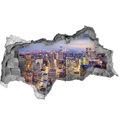 Adesivo con vista dietro il muro Lo skyline di New York di notte