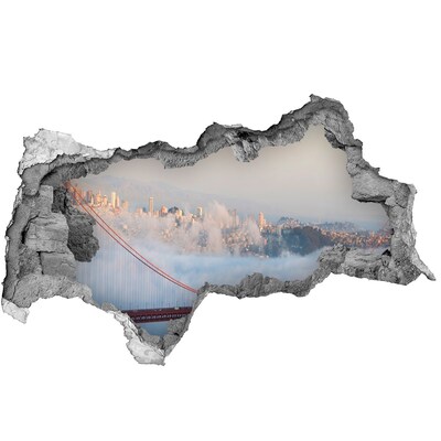 Sticker effetto rottura muro Il Golden Gate Bridge tra le nuvole