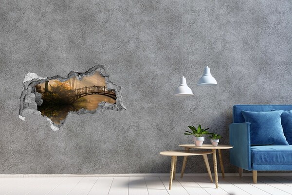 Sticker effetto rottura muro Un ponte in un parco nebbioso