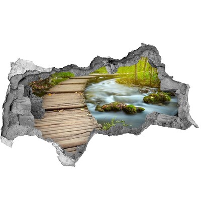 Adesivo con vista dietro il muro Un ruscello nella foresta