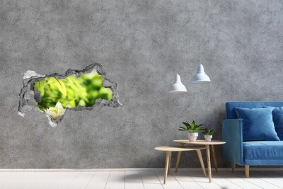 Decorazione da parete buco nel muro Un fiore in un giardino verde