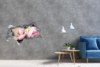 Adesivo con vista dietro il muro Fiori di magnolia sbocciano attraverso un buco nel muro