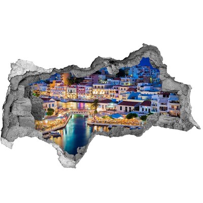 Adesivo con vista dietro il muro Una pittoresca cittadina costiera