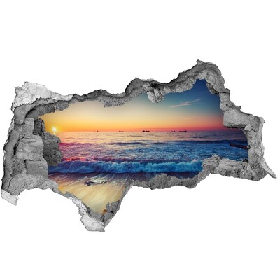 Sticker effetto rottura muro Tramonto sul mare