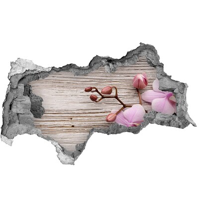 Sticker effetto rottura muro Fiori di orchidea su sfondo di legno