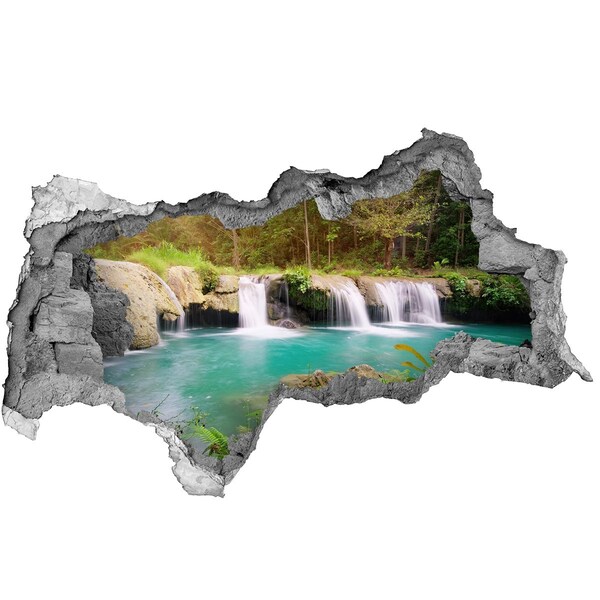 Sticker effetto rottura muro Cascate in una foresta tropicale