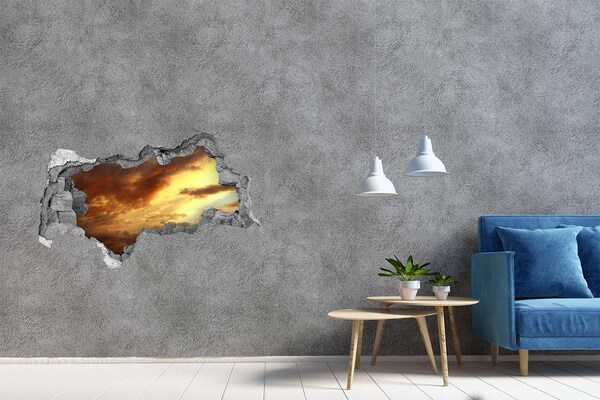 Sticker effetto rottura muro Tramonto attraverso un buco nel muro