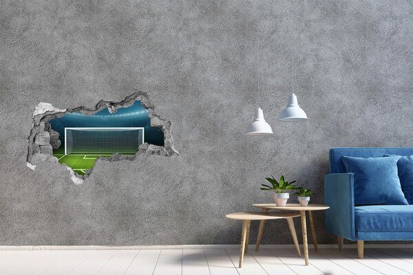 Adesivo con vista dietro il muro Lo stadio di calcio dietro il buco nel muro