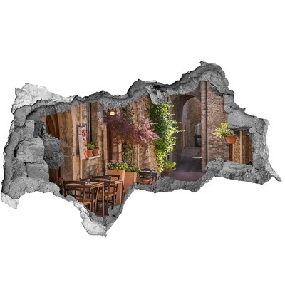 Sticker effetto rottura muro Una strada affascinante in città