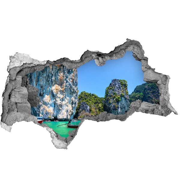 Adesivo con vista dietro il muro Baia caraibica con una barca